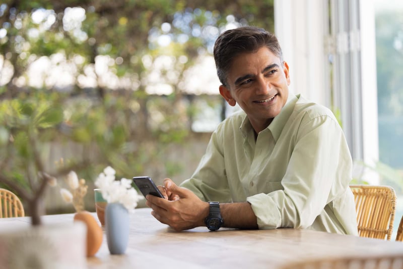 Happy man on phone